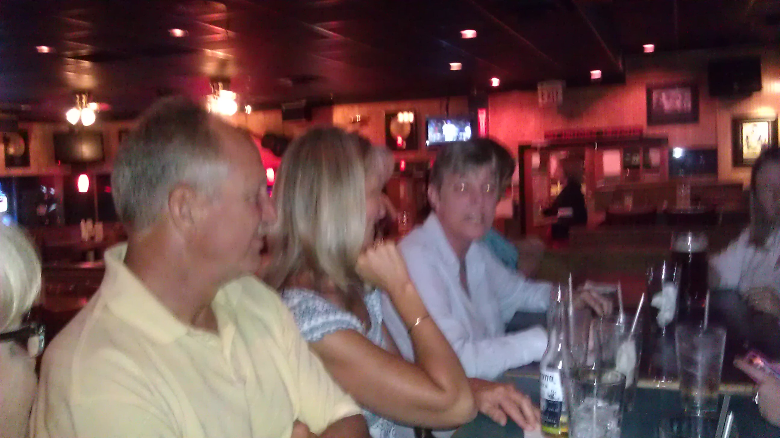 Bob in family picture at restaurant.